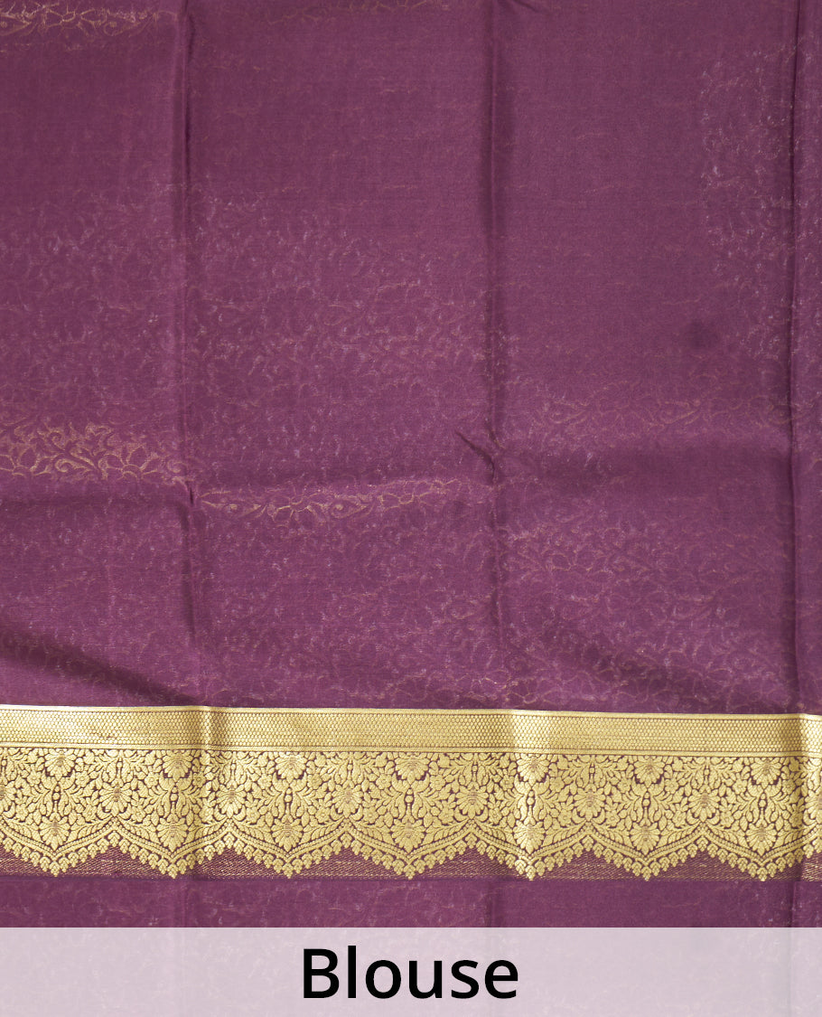 Orange Mysore Silk Saree Subtly Sparkled with Embossed Weave and Zari Buttas All Over Its Body, Complemented by a Contrast Zari Border of Scallop Designs, a Gleaming Pallu of Floral Jaal Design, and a Contrast Blouse