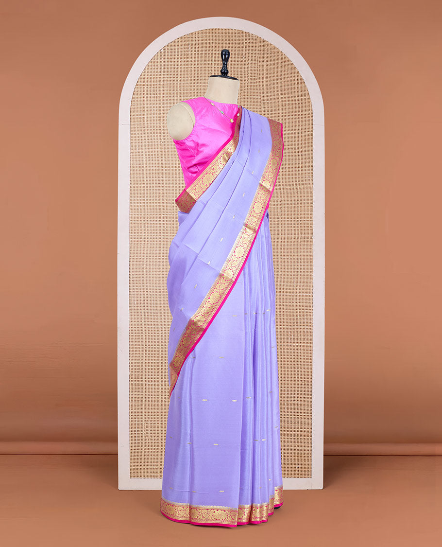 Lavender Mysore Silk Saree Ornamented with Zari Buttas All Over Its Body, Complemented by a Contrast Border of Floral Zari Designs, a Subtly Sparkled Pallu of Zari Designs, and a Contrast Blouse