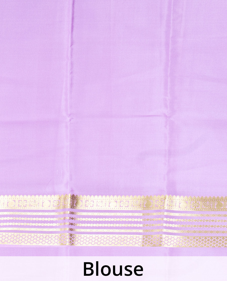 Green Plain Mysore Silk Saree, Complemented by a Contrast Varisai Pettu Border of Traditional Zari Designs, a Subtly Sparkled Pallu of Zari Stripes, and a Contrast Blouse