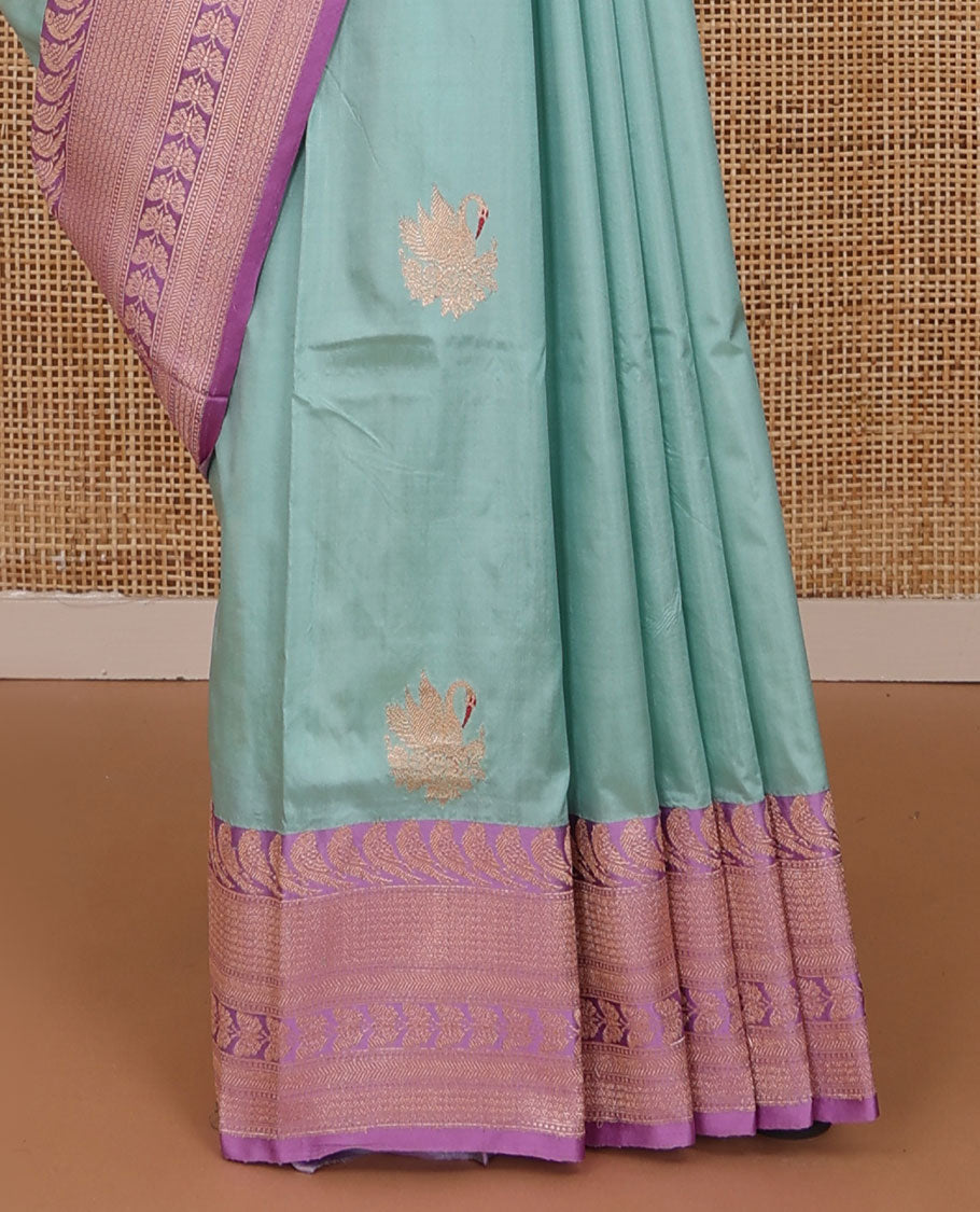 Blue zari swan buttas katan silk saree, contrast bird, and floral design border, and jaal pallu