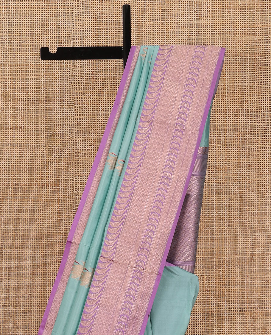 Blue zari swan buttas katan silk saree, contrast bird, and floral design border, and jaal pallu