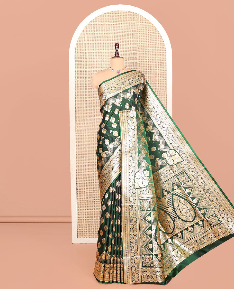 Green Banarasi Nylon Saree, Richly Detailed with Zari Buttas, Highlighted by a Traditional Zari Border, Intricate Pallu, and a Matching Blouse