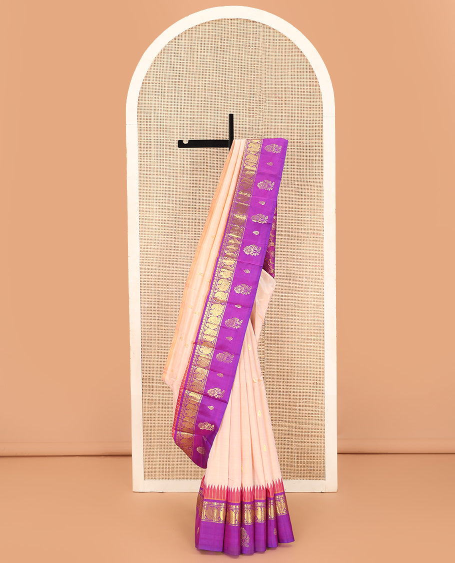 Sandal zari buttas Kanchipuram silk saree, contrast one-sided thazampoo rekku border of thilakam mokku and mayil zari motifs, and zari woven pallu