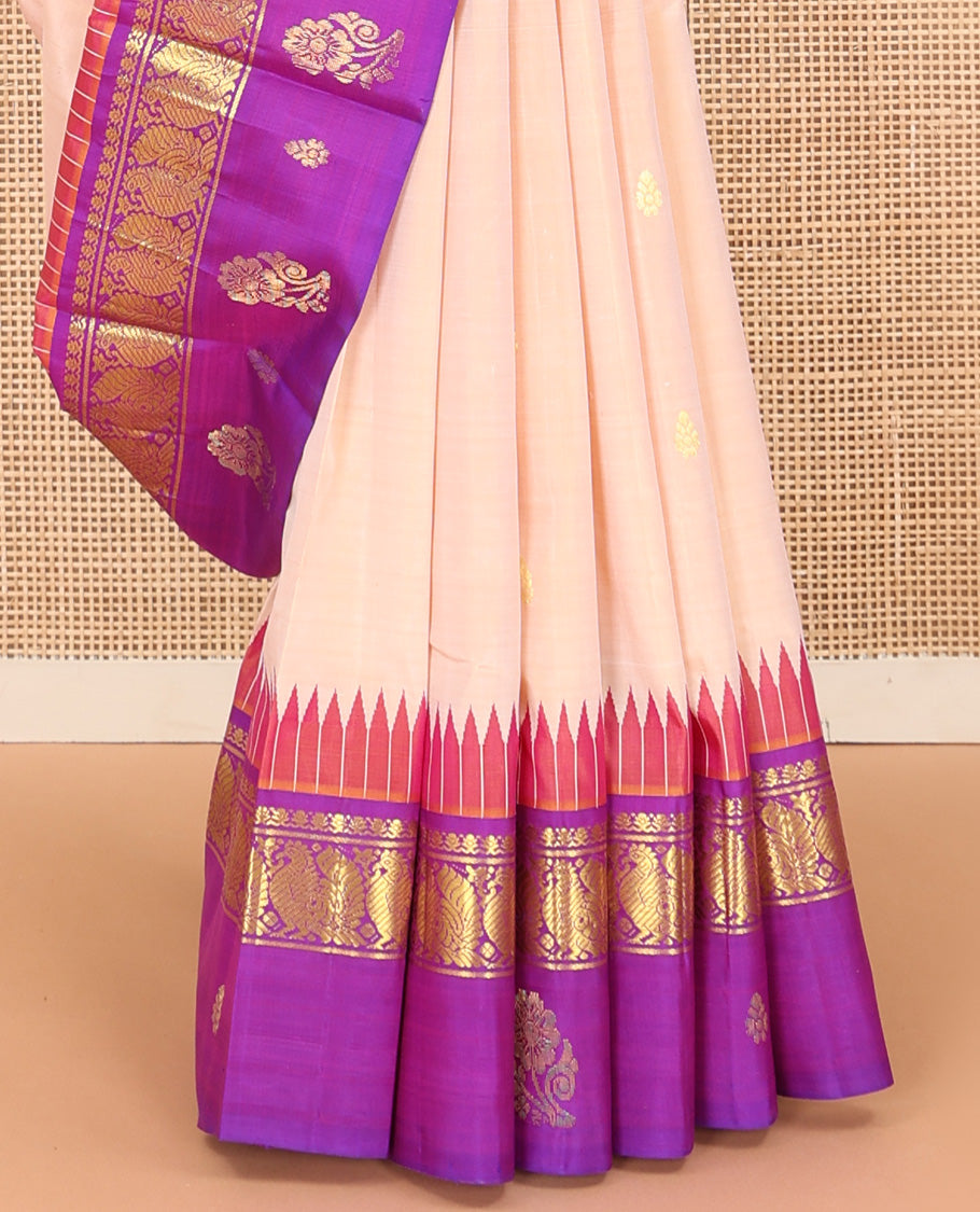 Sandal zari buttas Kanchipuram silk saree, contrast one-sided thazampoo rekku border of thilakam mokku and mayil zari motifs, and zari woven pallu