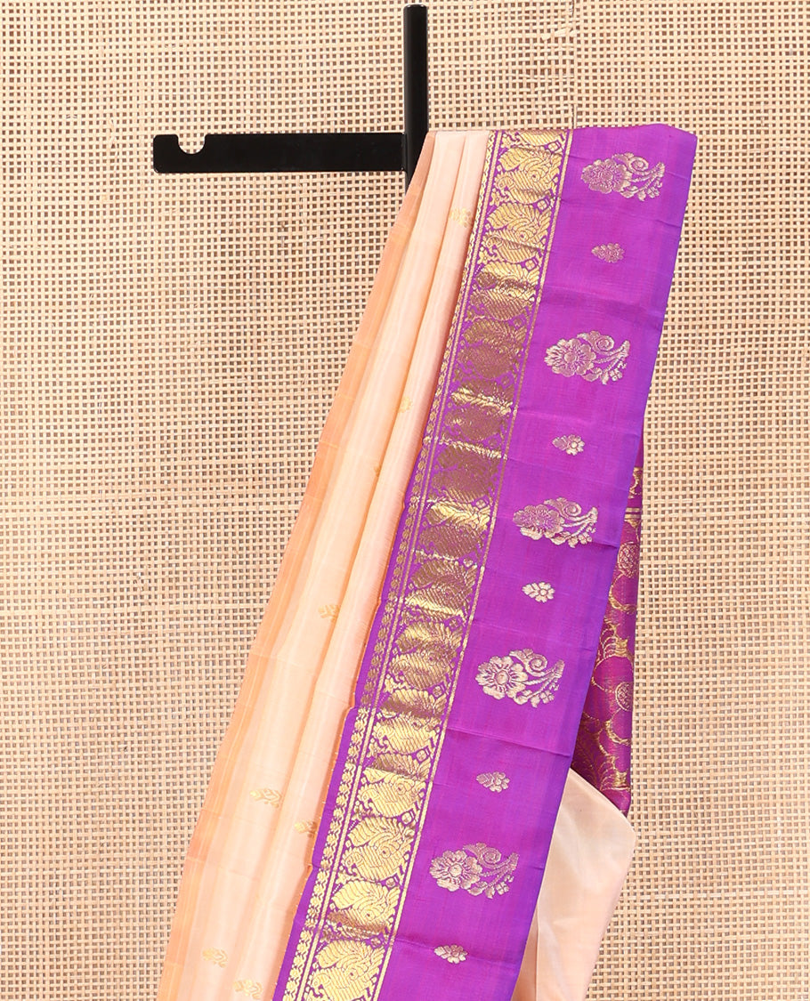 Sandal zari buttas Kanchipuram silk saree, contrast one-sided thazampoo rekku border of thilakam mokku and mayil zari motifs, and zari woven pallu