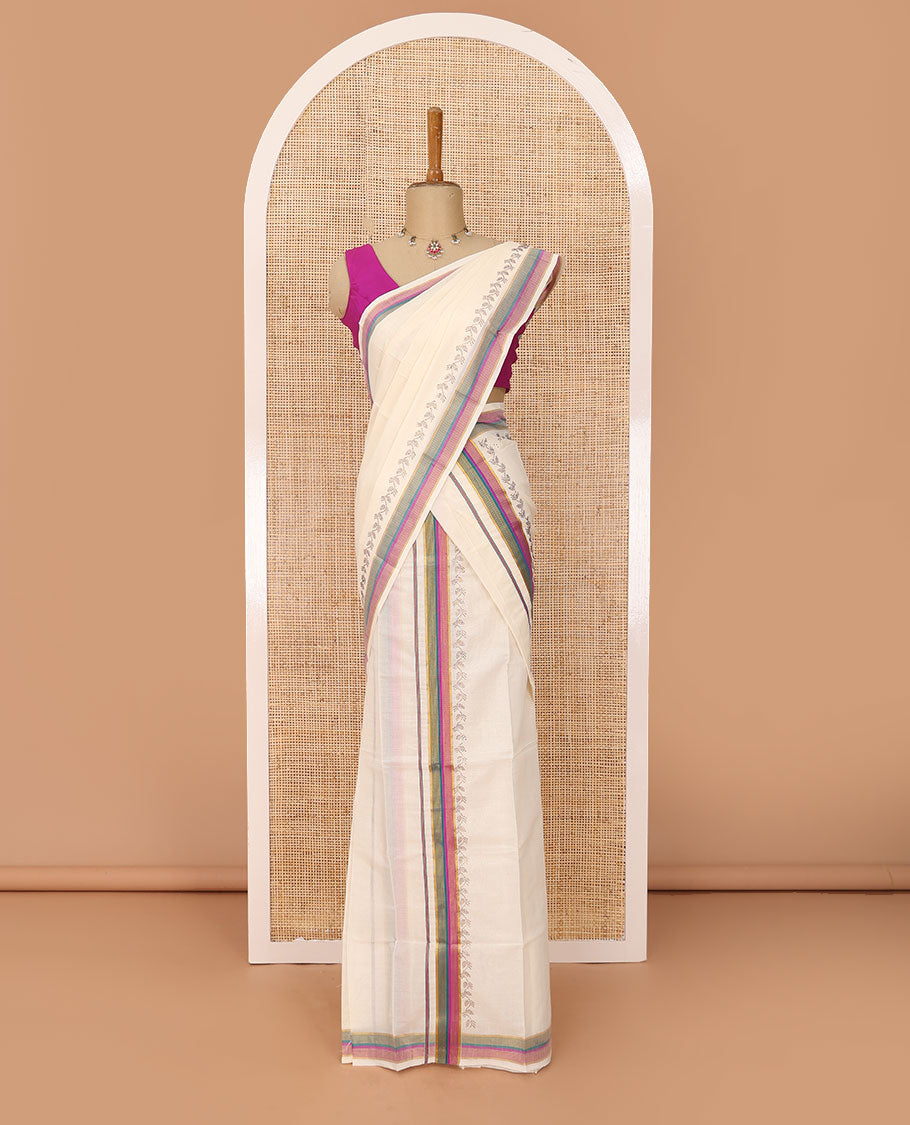Cream plain Kerala mundu set with contrast multi-color striped border & micro-stone work