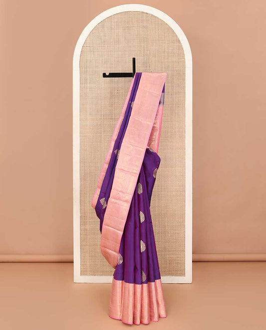 Violet silk saree with zari buttas, contrast border of thilakam mokku,kuyil kann, neli,muthu,banaras, and kodi visiry, and manga jaal pallu