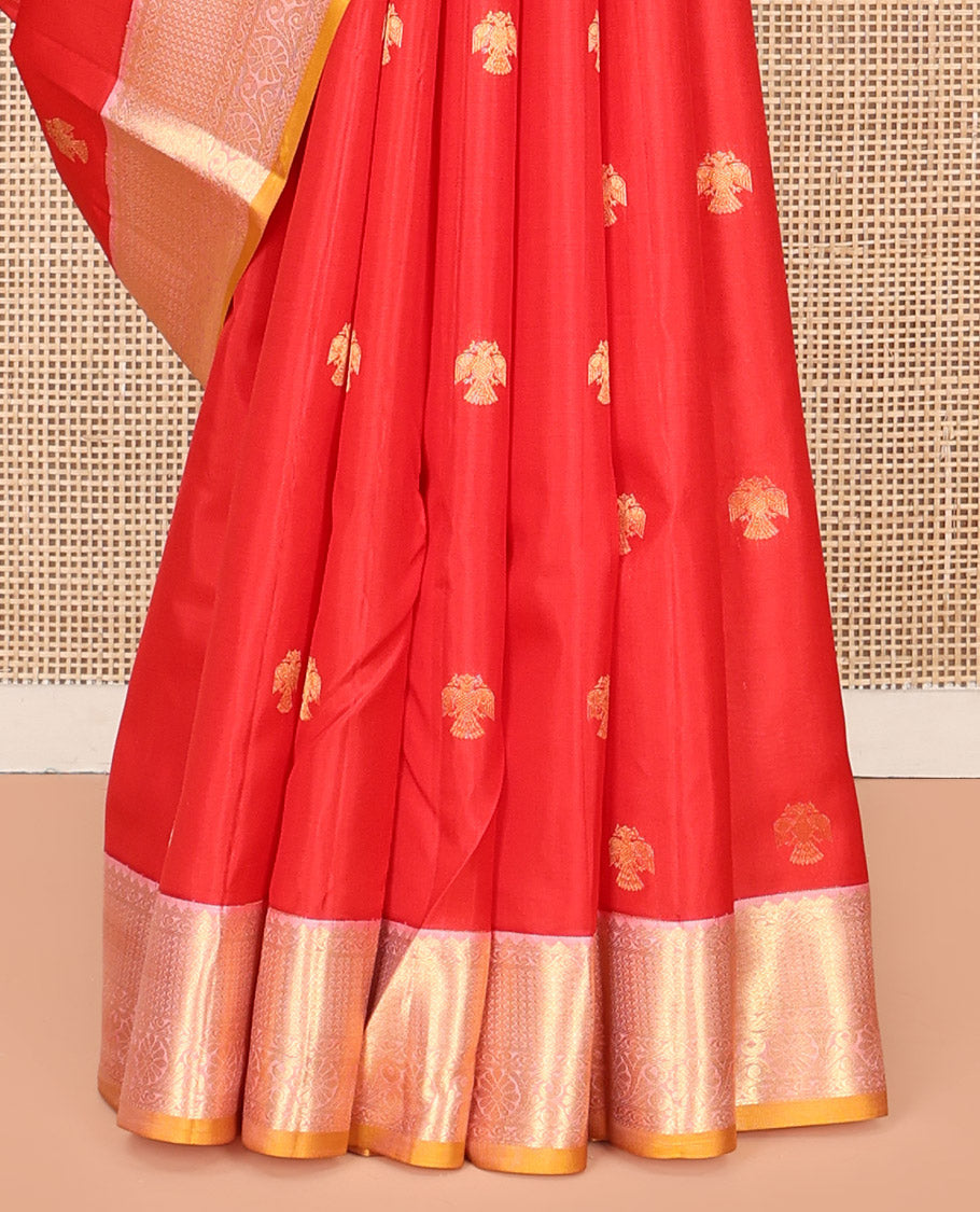 Red Vasundhara Silk Saree, Beautifully Bedecked with Iruthalai Pakshi Buttas All Over Its Body, Complemented by a Contrast Border of Rekku, Then Kuli Kann, and Kodi Visiry Designs, Grand Pallu, and Paired with a Contrast Blouse