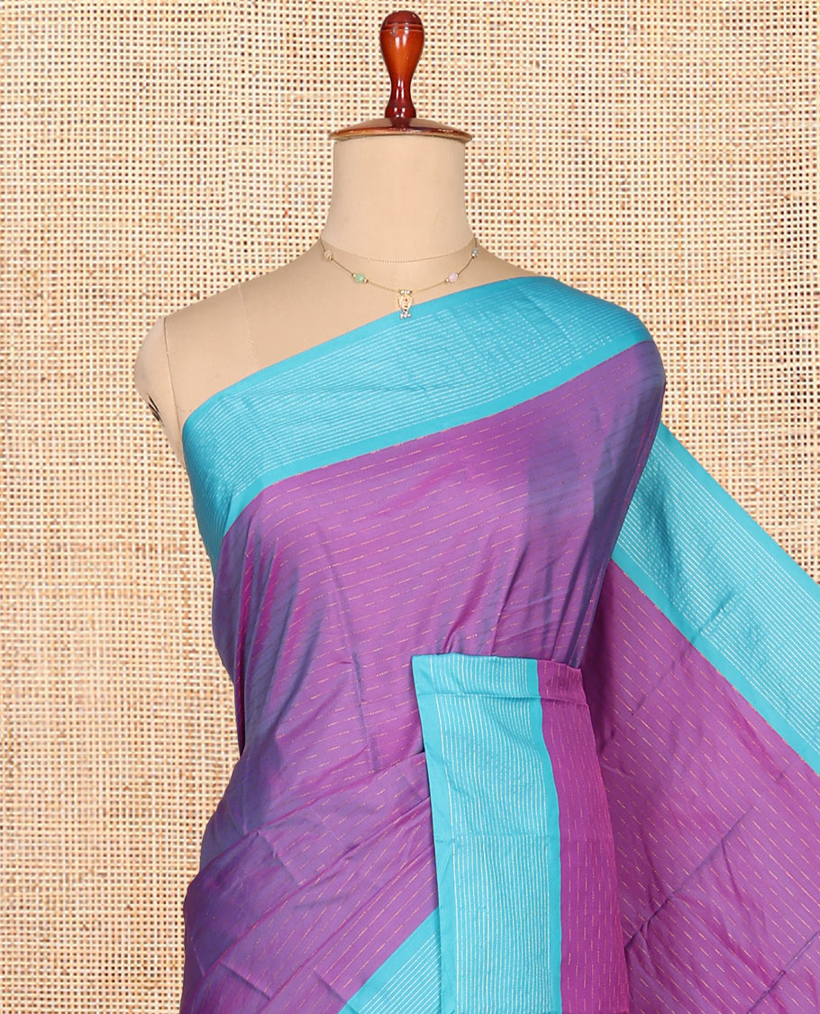 Violet Aarani Gift Saree, Woven with Zari Buttas on Its Body, Complemented by a Contrast Border, Pallu of Stripes, and Paired with a Matching Blouse