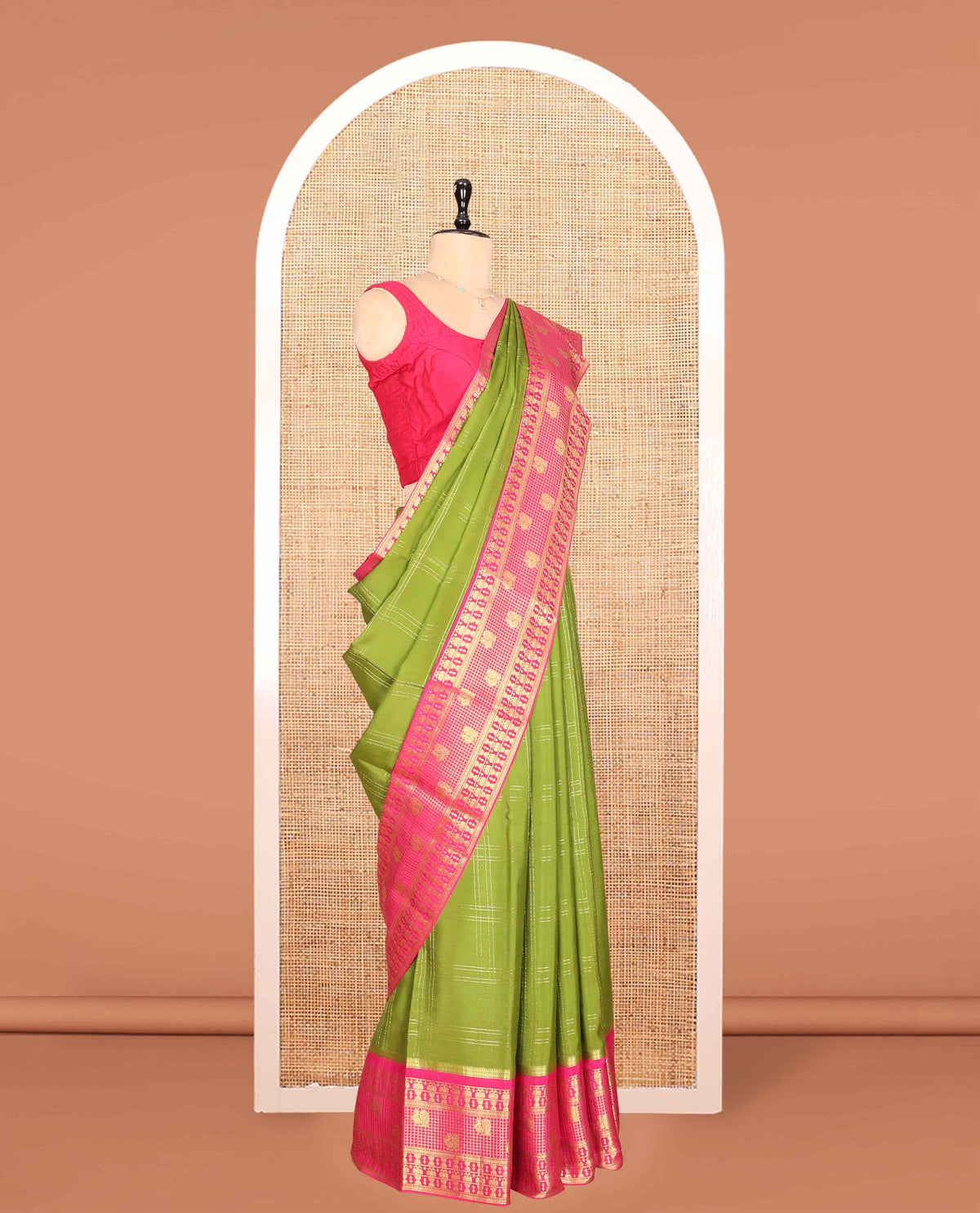 Green Mysore Silk Saree, Gracefully Embellished with Zari Checks, a Contrast Iruthalai Pakshi-Peacock Zari Border, Grand Pallu, and a Contrast Blouse