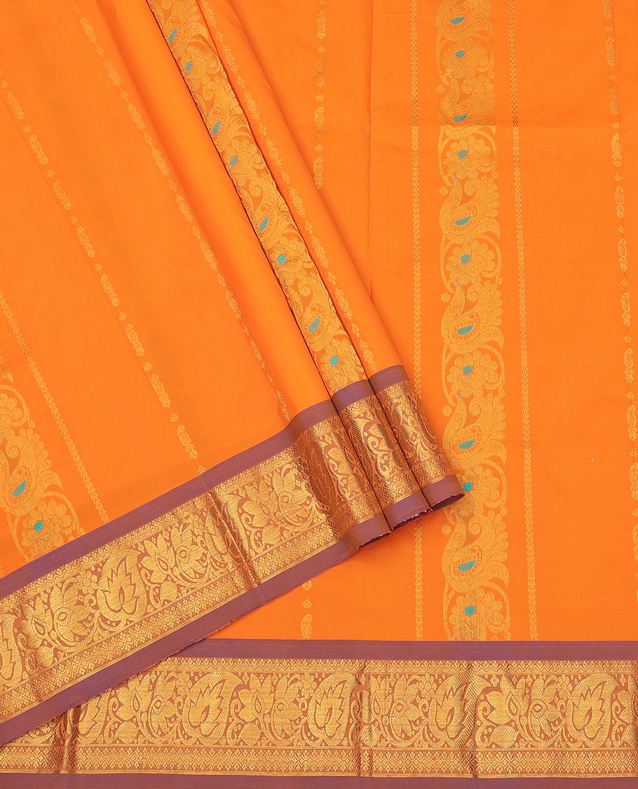 Orange Art Silk Pavadai Material Set, Woven with Zari Designs on Its Skirt, Complemented by a Contrast Traditional Zari Border, and a Matching Blouse