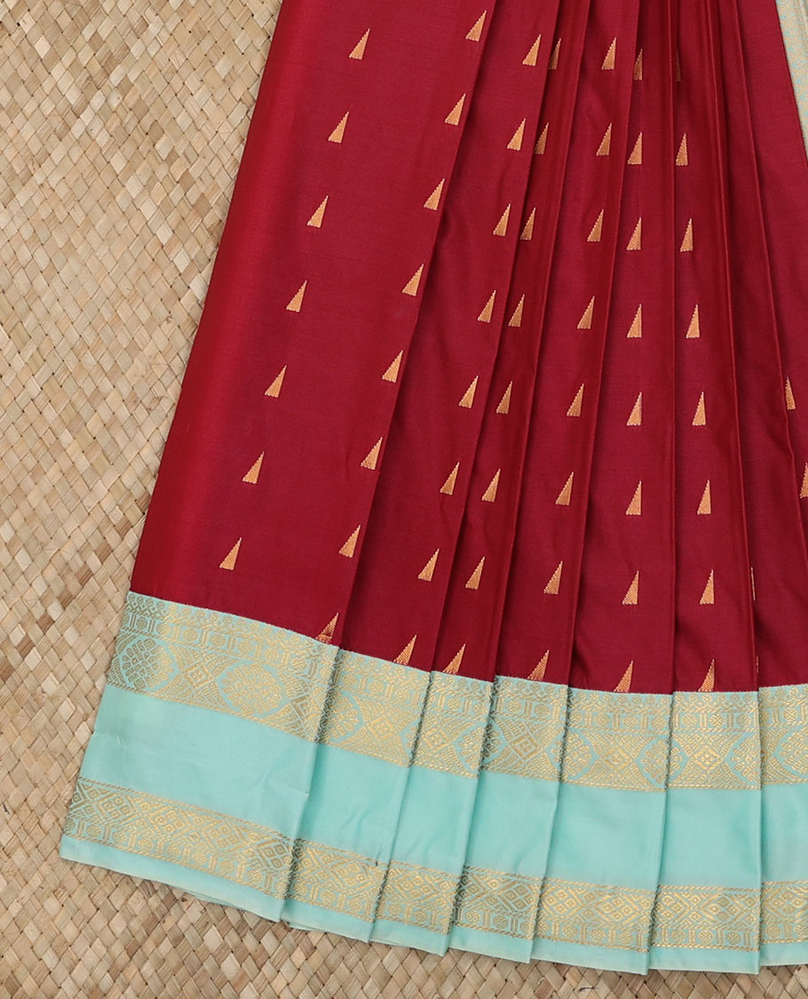 Red Budget Silk Saree Adorned with Zari Buttas Across Its Body, Featuring a Contrast Traditional Zari Motifs Woven Rettai Pettu Border, Subtle Jaal Pallu, and Attached with a Contrast Blouse