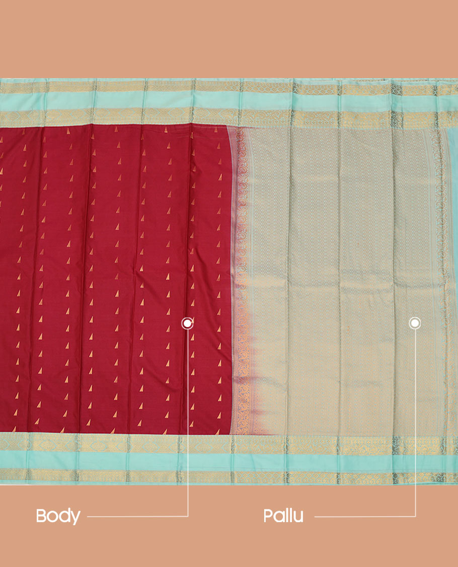 Red Budget Silk Saree Adorned with Zari Buttas Across Its Body, Featuring a Contrast Traditional Zari Motifs Woven Rettai Pettu Border, Subtle Jaal Pallu, and Attached with a Contrast Blouse
