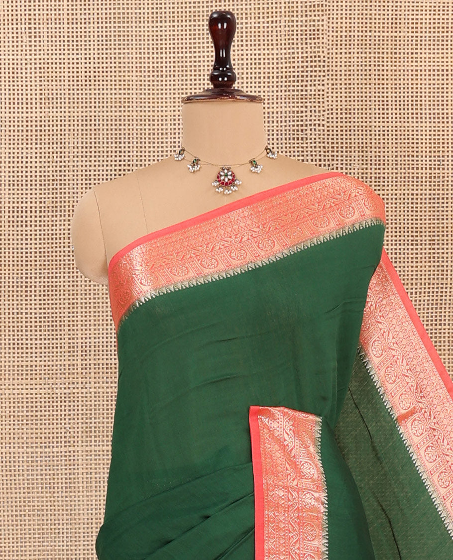 Green Plain Assam Silk Saree, Complemented by Captivating Contrast Border Featuring Traditional Zari Designs, Gleaming Zari Woven Pallu, and Paired with a Contrast Blouse
