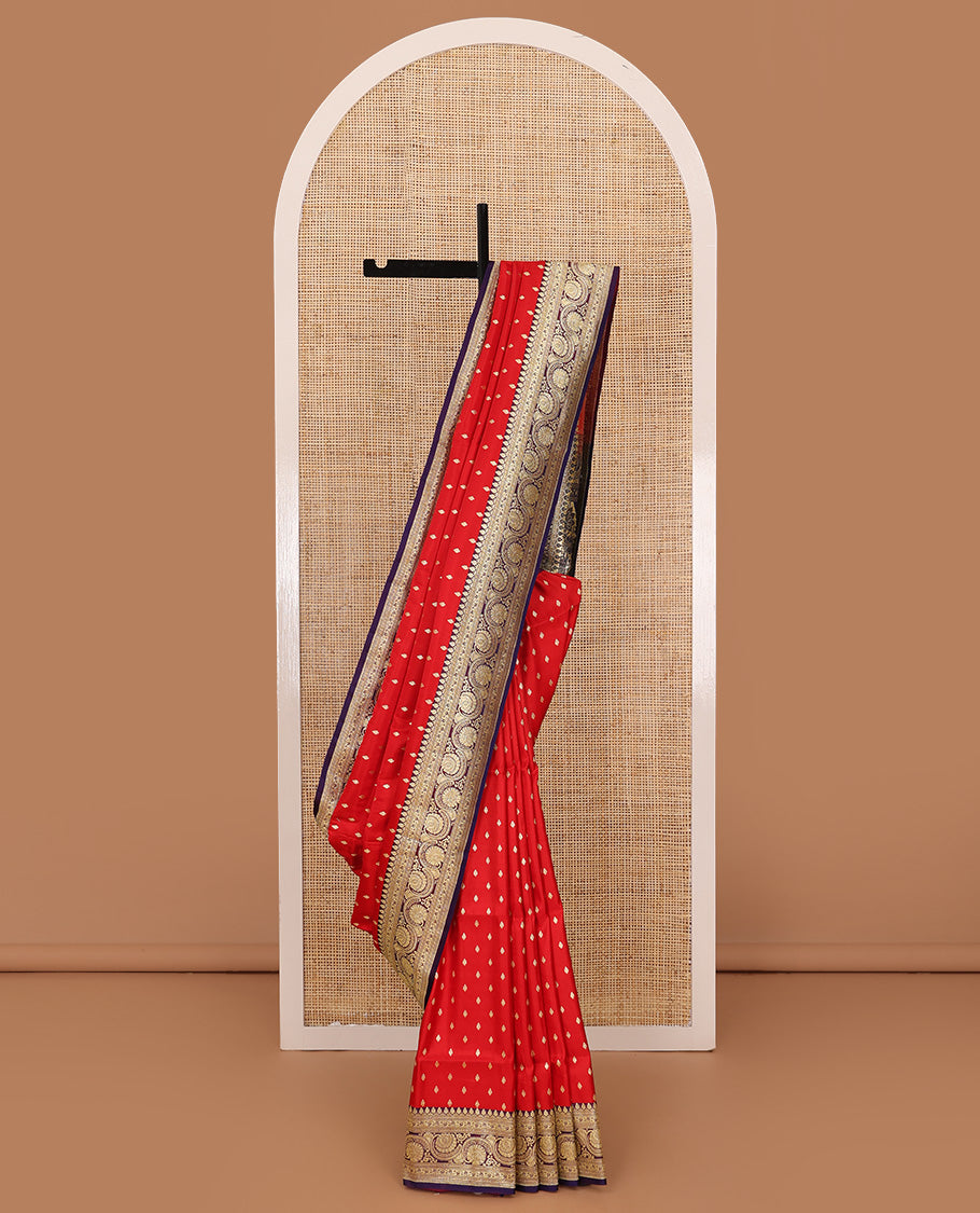 Red zari buttas banarasi silk saree, contrast traditional border of floral creeper design, and floral-paisley zari woven pallu