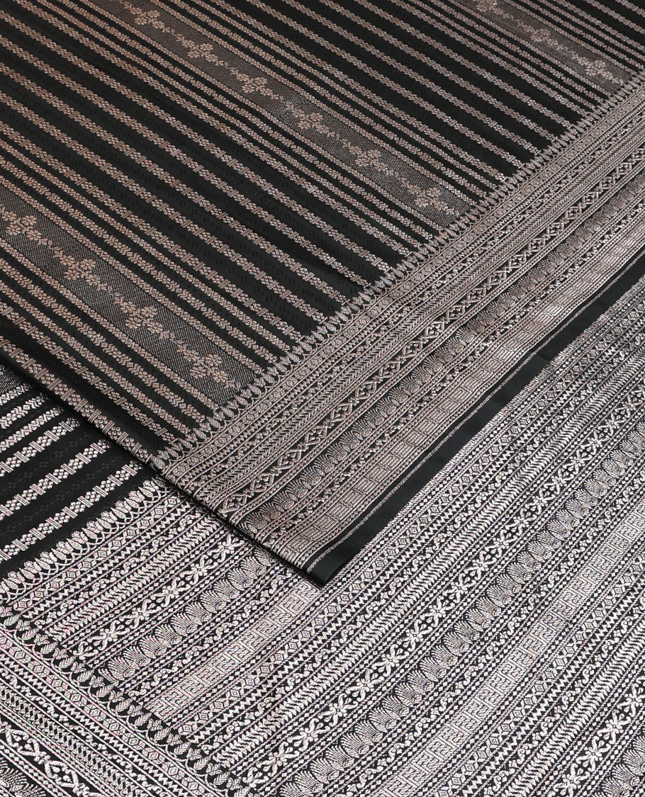 Black geometric jacquard satin silk saree, zari border and pallu steeped with traditional zari designs