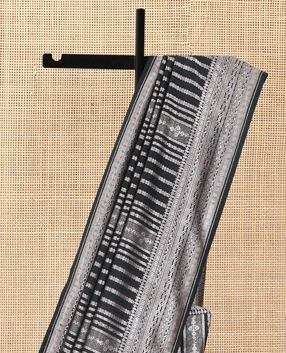 Black geometric jacquard satin silk saree, zari border and pallu steeped with traditional zari designs