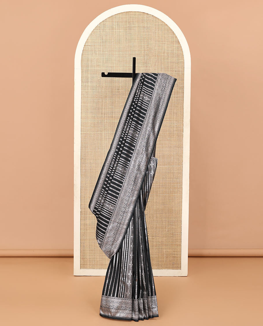Black geometric jacquard satin silk saree, zari border and pallu steeped with traditional zari designs