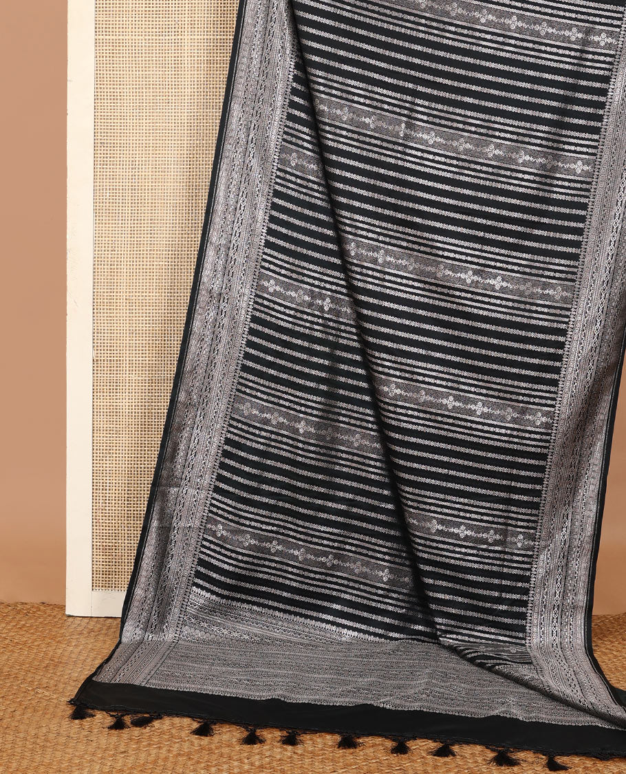 Black geometric jacquard satin silk saree, zari border and pallu steeped with traditional zari designs