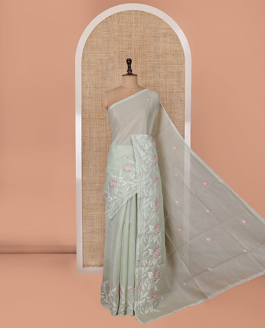 Green Kota Cotton Saree, Artfully Detailed with Floral Motifs Thread Embroidery on Its Body, Scallop Lace Border, Pallu Pictures Same Embroidery, and Paired with a Matching Blouse