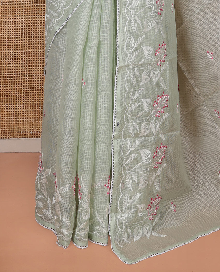 Green Kota Cotton Saree, Artfully Detailed with Floral Motifs Thread Embroidery on Its Body, Scallop Lace Border, Pallu Pictures Same Embroidery, and Paired with a Matching Blouse