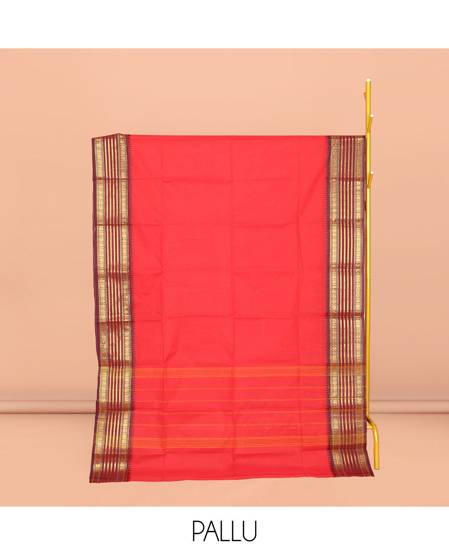 Red Plain Chettinad Cotton Saree, Complemented by a Contrast Traditional Zari Design Temple Border, Subtly Striped Pallu, and Paired with a Matching Blouse