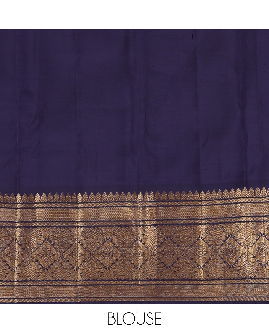 Pink zari buttas and checked Kanchipuram silk saree, contrast border of thazampoo rekku, kathir, mayil kann, and jaal designs