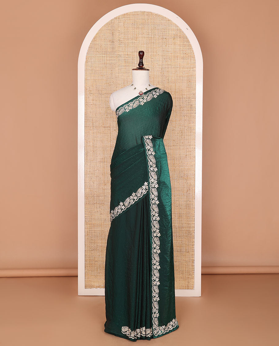 Deep forest green micro stone embedded designer saree, scallop Crystal stones border of floral and leaf motifs
