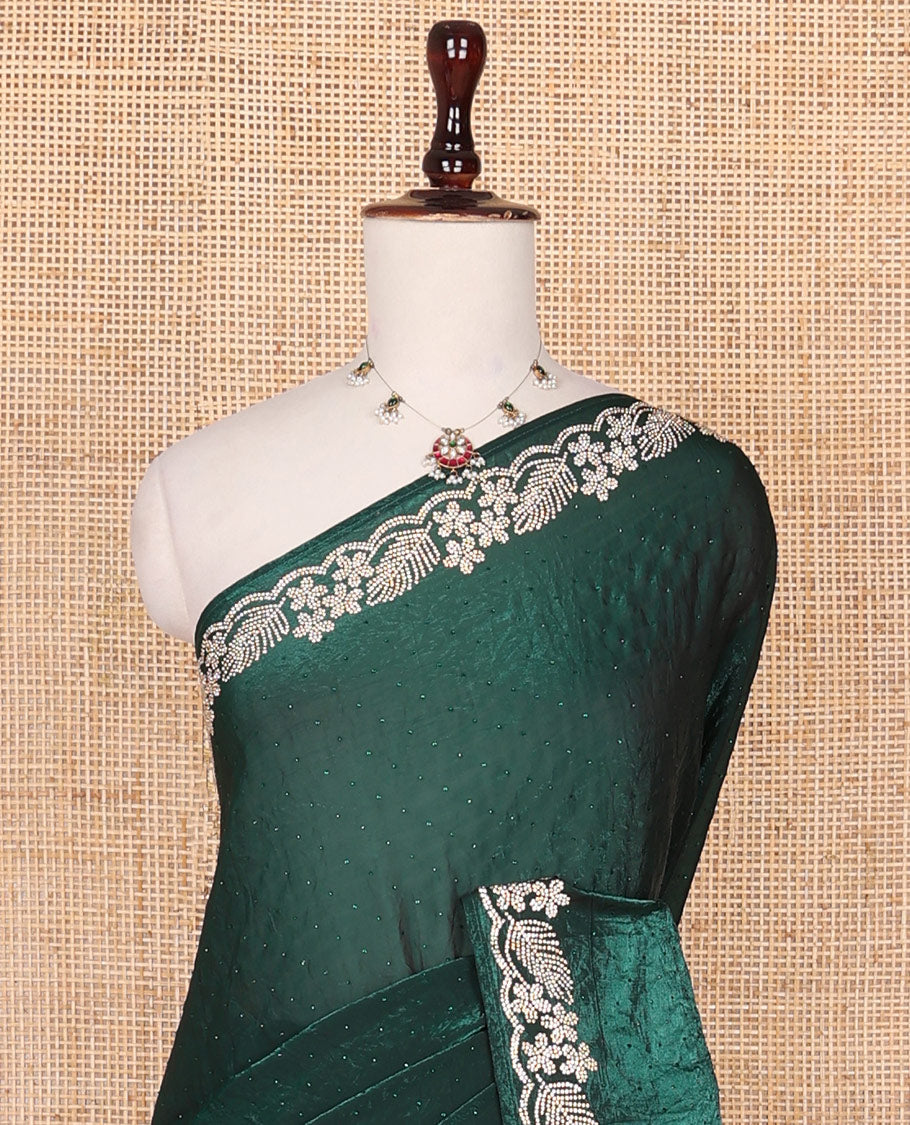 Deep forest green micro stone embedded designer saree, scallop Crystal stones border of floral and leaf motifs