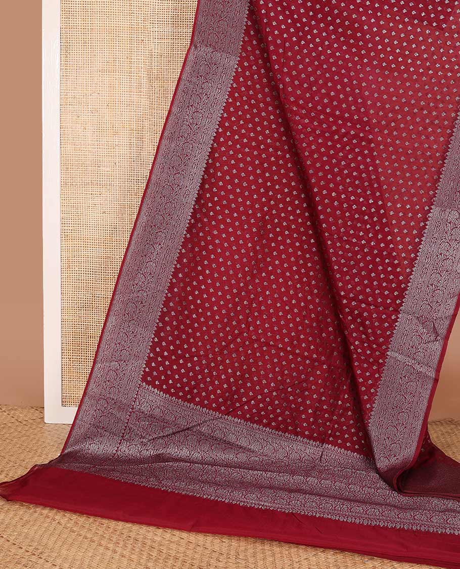 Maroon zari buttas fancy saree, zari floral creeper border, and floral jaal pallu
