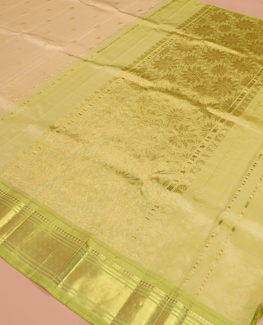 Sandal zari buttas Kanchipuram silk saree, contrast one-sided border of paneer sombu, banaras, and jaal designs, and pallu of floral designs