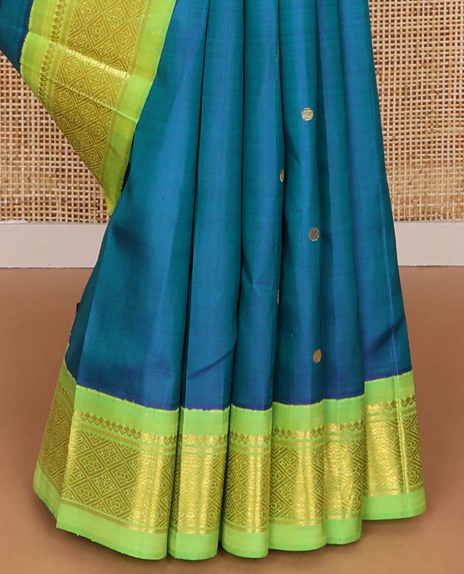 Blue round buttas kancheepuram silk saree with contrast korvai border of thilakam mokku, banaras design & zari design pallu