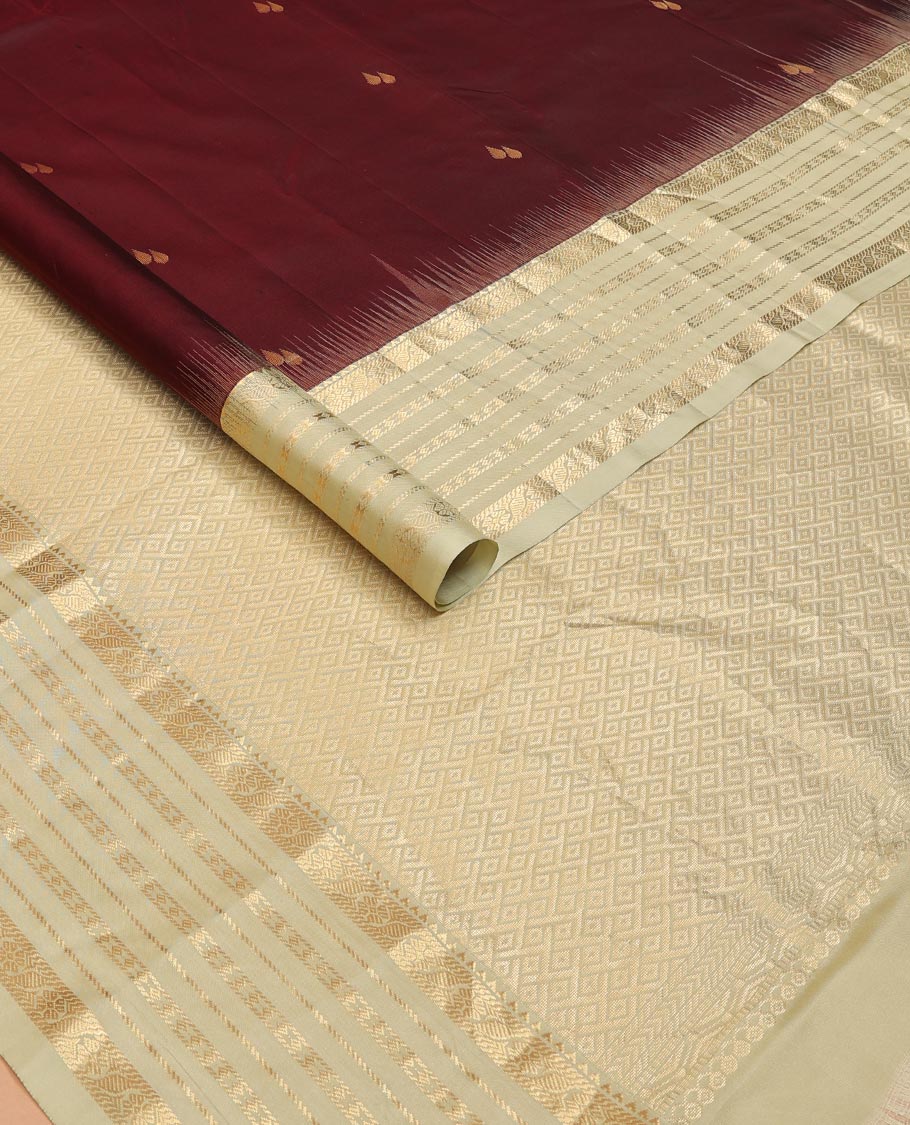 Maroon zari buttas silk saree, contrast border of rekku,banaras,cross kamalam & diamond & jaal pallu