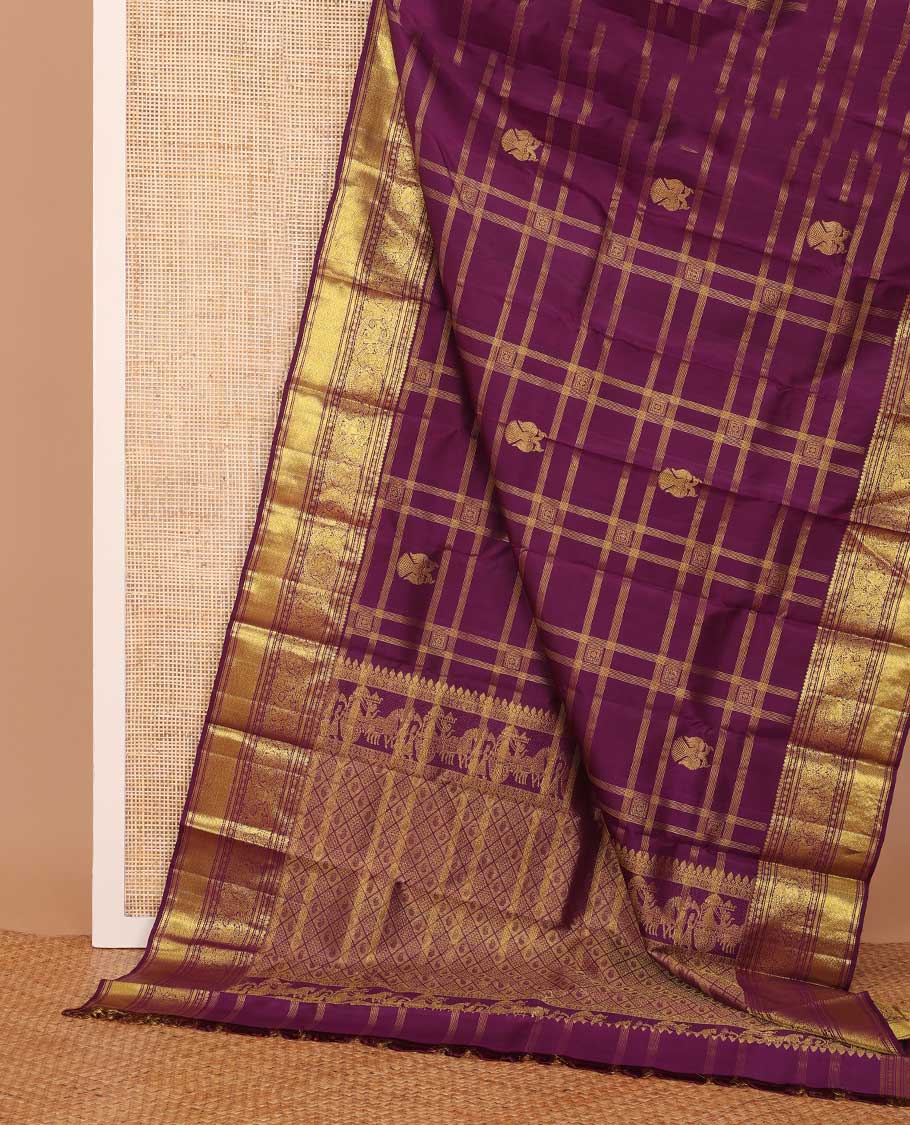 Purple buttas and checked Kanchipuram silksaree,border of thilakam mokku,muthu,rudraksham,kathir,mayil, and paimadi kattam and jaal pallu
