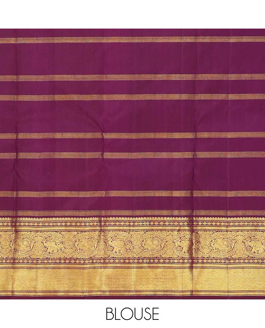 Purple buttas and checked Kanchipuram silksaree,border of thilakam mokku,muthu,rudraksham,kathir,mayil, and paimadi kattam and jaal pallu