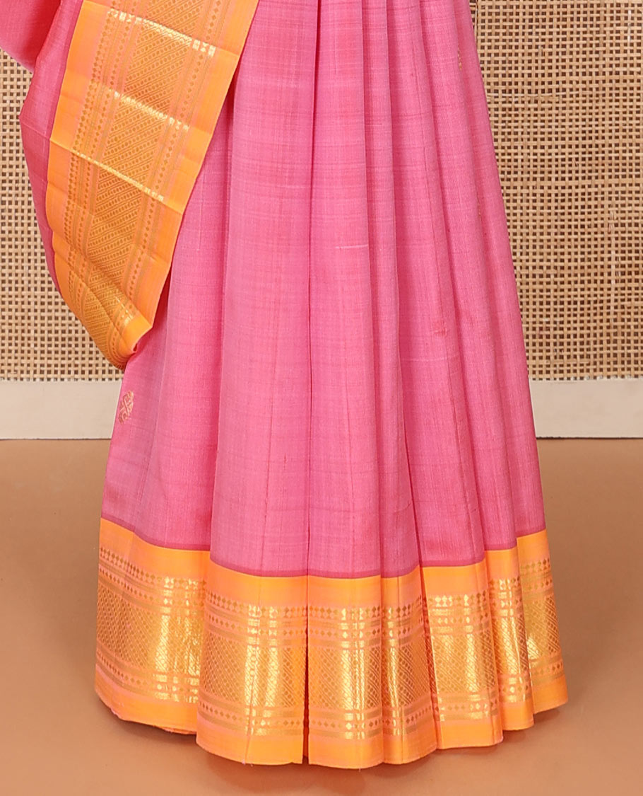 Pink zari buttas Kanchipuram silk saree, contrast one-sided border of panner sombu, banaras, diamond, and paisa designs, and zari design pallu