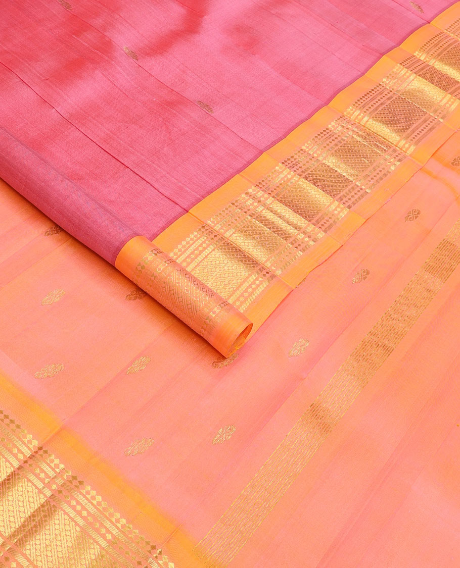 Pink zari buttas Kanchipuram silk saree, contrast one-sided border of panner sombu, banaras, diamond, and paisa designs, and zari design pallu