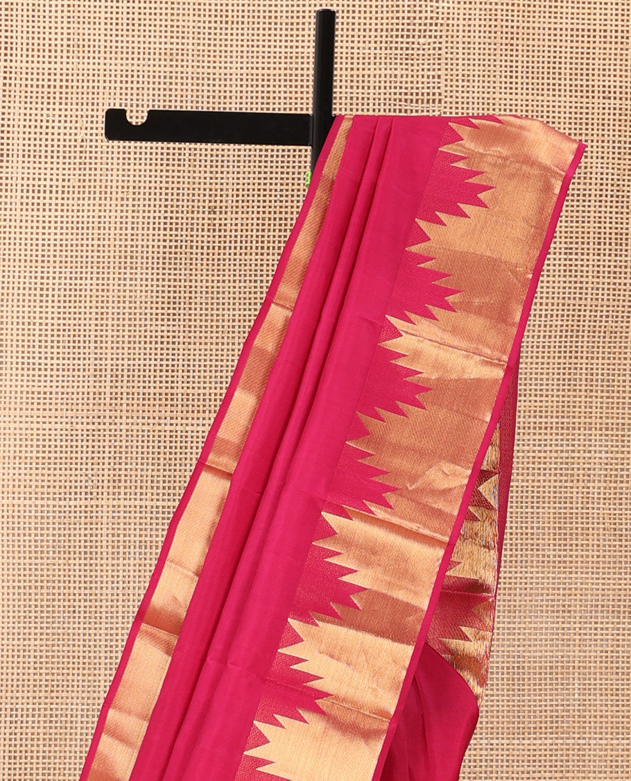 Red plain Kanchipuram silk saree, thazampoo rekku zari border, and pallu of mayil kann