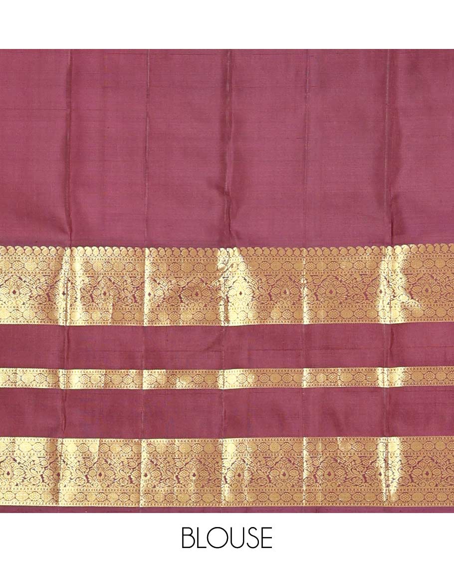 Red zari buttas Kanchipuram silk saree, contrast border of manga mokku, poun, laddu kamalam, and zari designs, and jaal pallu