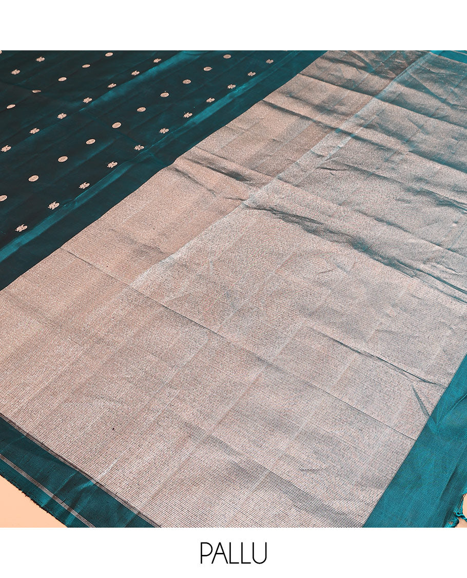 Peacock blue annam chakram buttas soft silk saree, zari piping border, and zari striped pallu