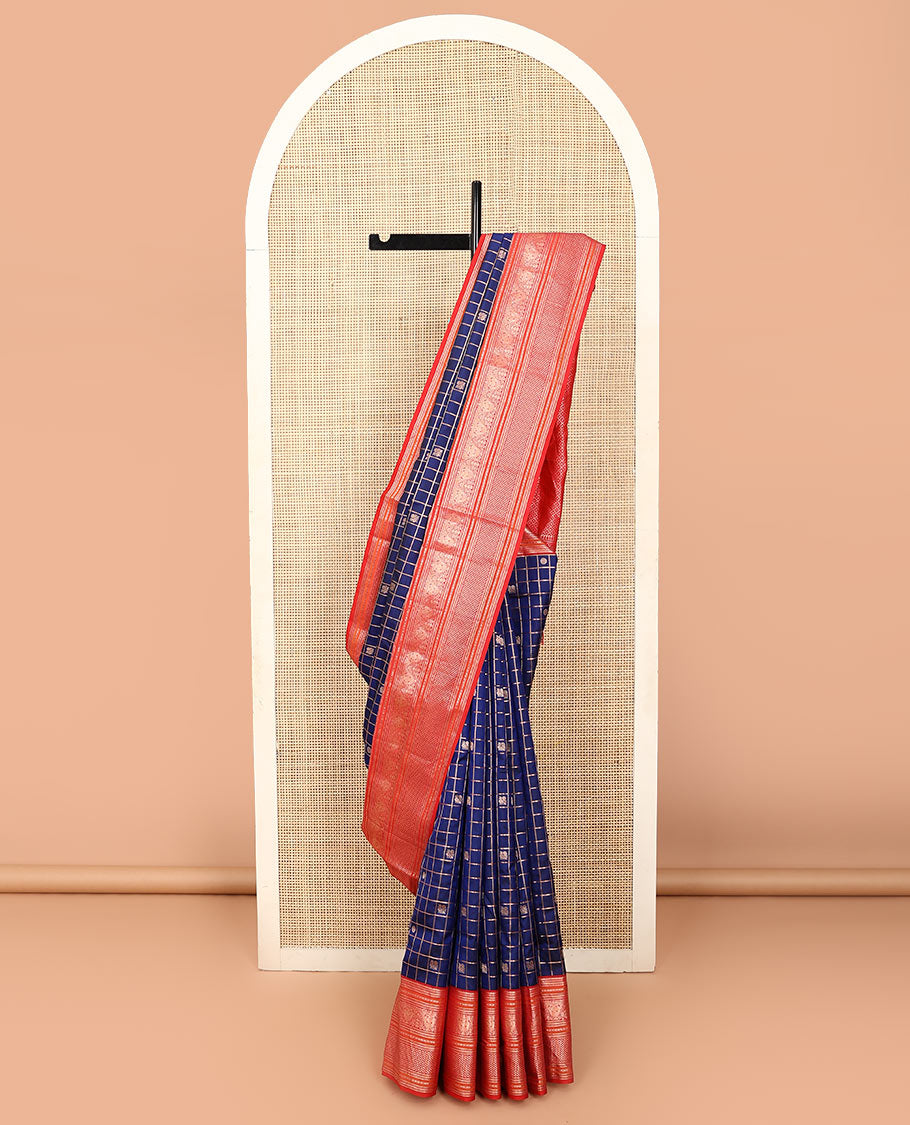 Blue zari checked with annam chakram buttas silk saree, contrast border of thilakam mokku, iruthalai pakshi, and ara maadam designs, and jaal pallu