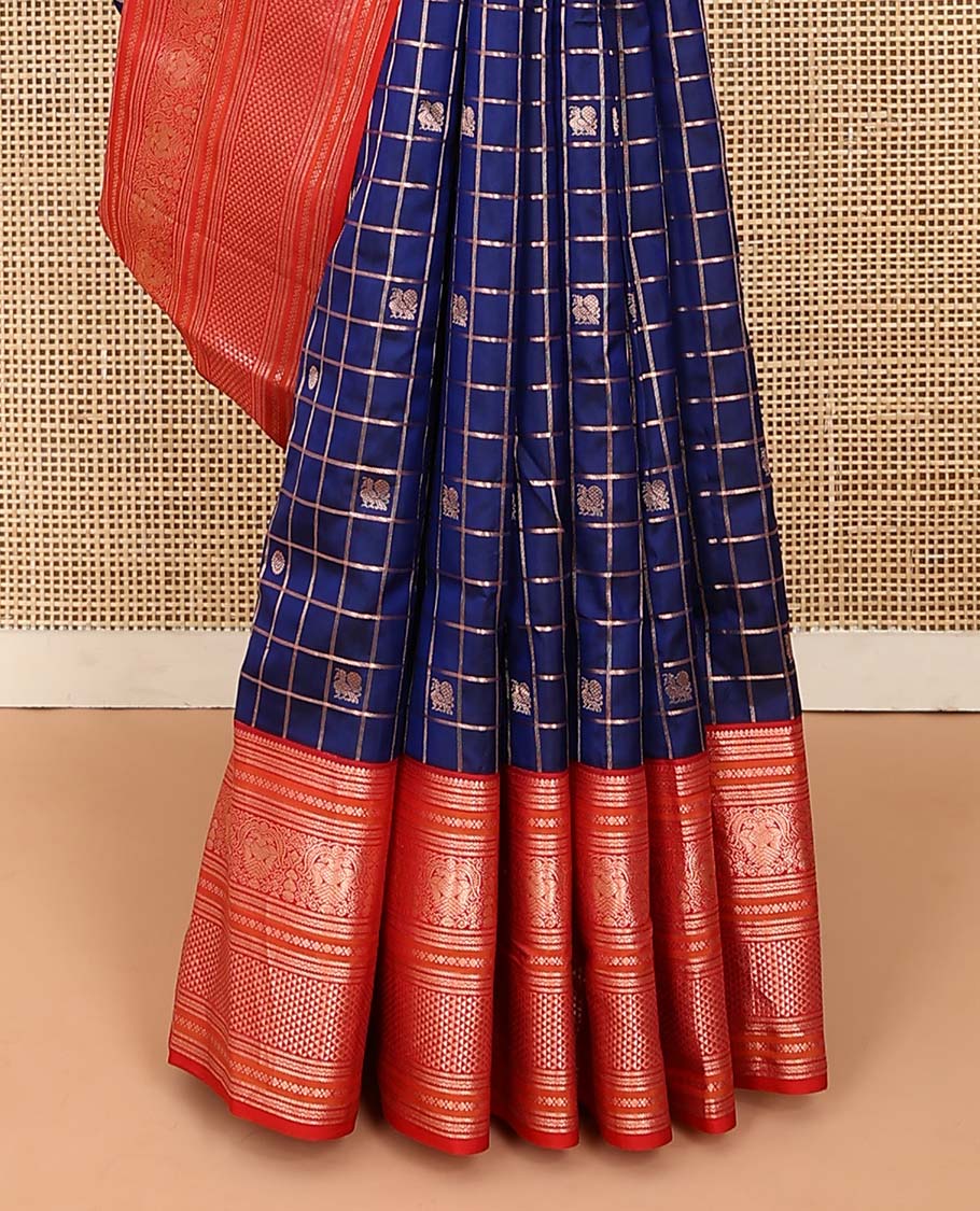 Blue zari checked with annam chakram buttas silk saree, contrast border of thilakam mokku, iruthalai pakshi, and ara maadam designs, and jaal pallu
