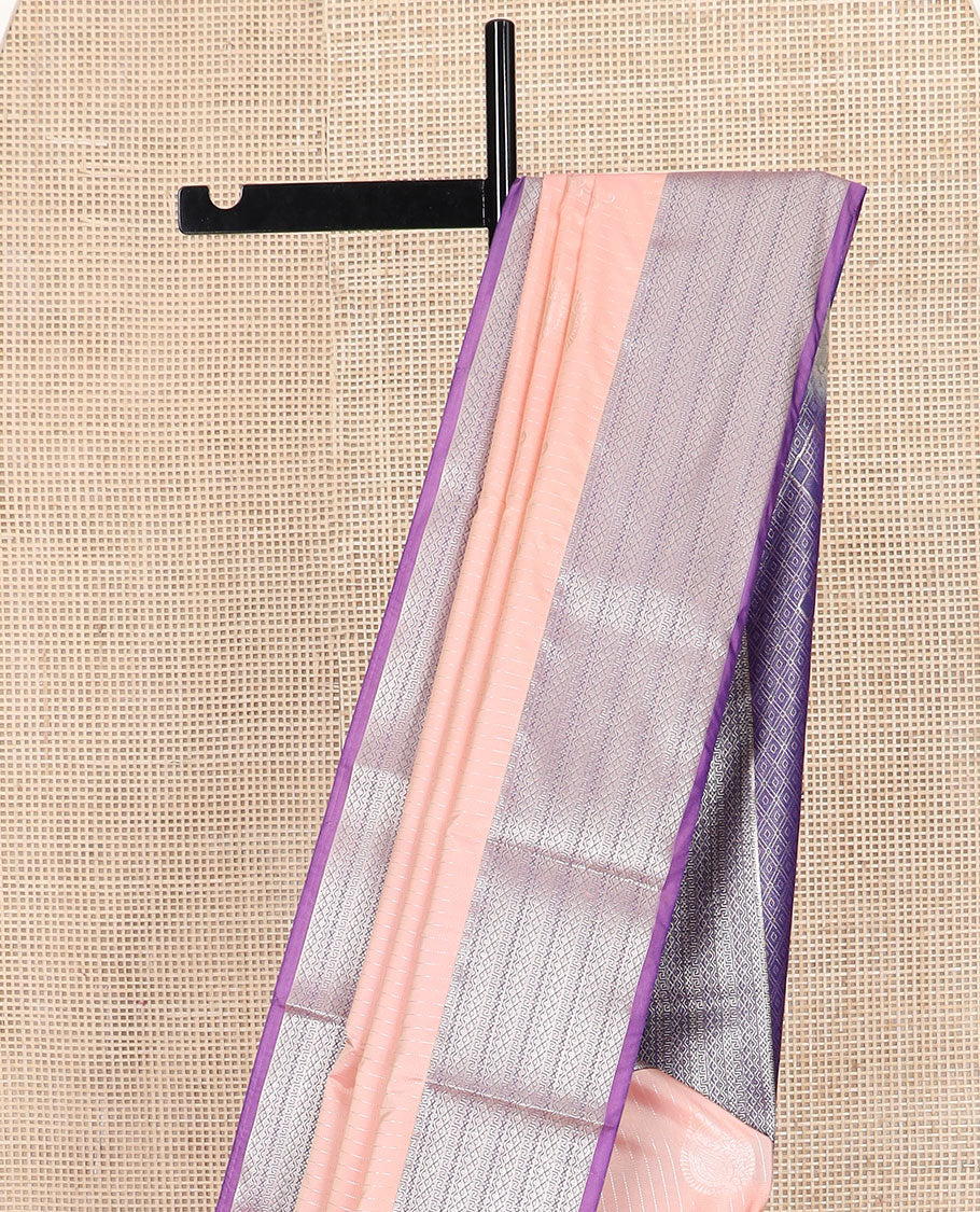 Peach zari design soft silk saree, contrast traditional zari design border, and a zari-rich jaal pallu