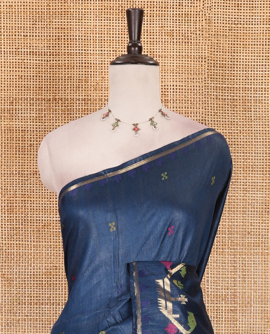 Navy blue multi-color buttas tussar silk saree, jamdani floral creeper border, and pallu of zari design