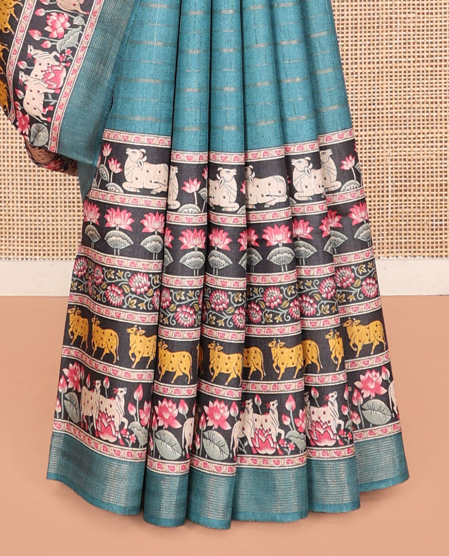 Blue Tussar Silk Saree, Sparsely Threaded with Stripes, Complemented by a Contrast Pichwai Cow-Lotus Print Border, Printed Pallu, and a Contrast Blouse