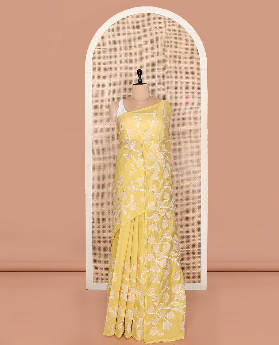 Yellow Fancy Tussar Saree, Artfully Detailed with Floral Vine Embroidery, a Subtle Scallop Border, and a Matching Blouse