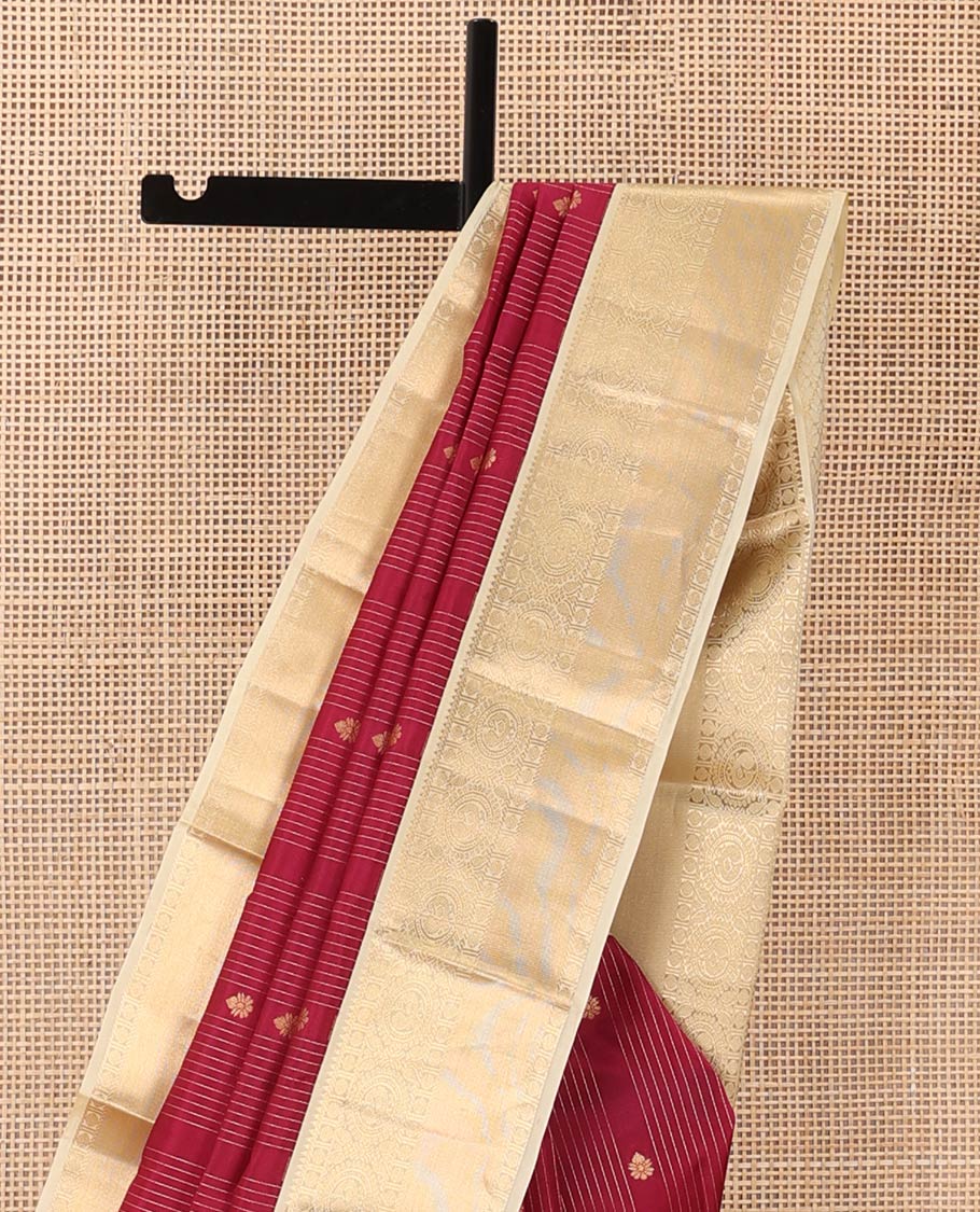 Red stripes, and buttas Vasundhara silk mix saree, contrast border of rekku, muthu, rudraksham, and round mayil designs, and jaal pallu