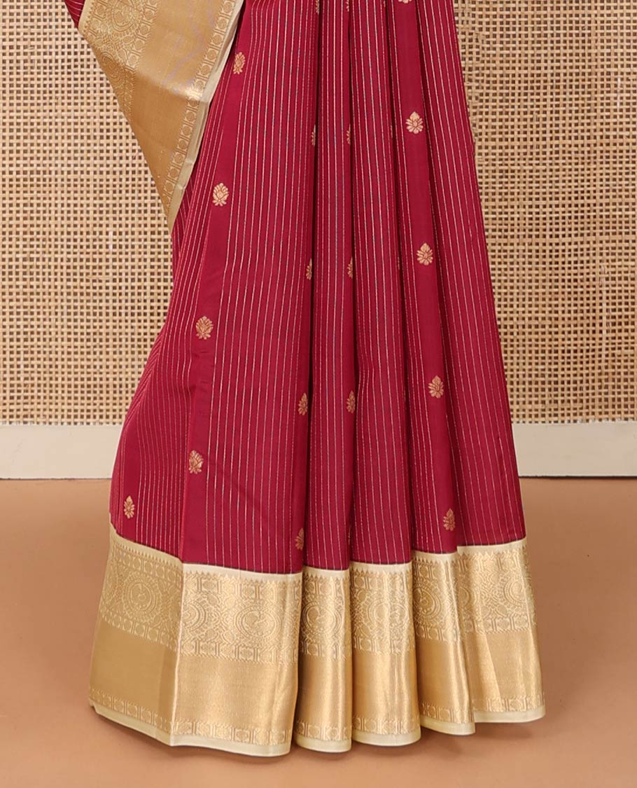Red stripes, and buttas Vasundhara silk mix saree, contrast border of rekku, muthu, rudraksham, and round mayil designs, and jaal pallu