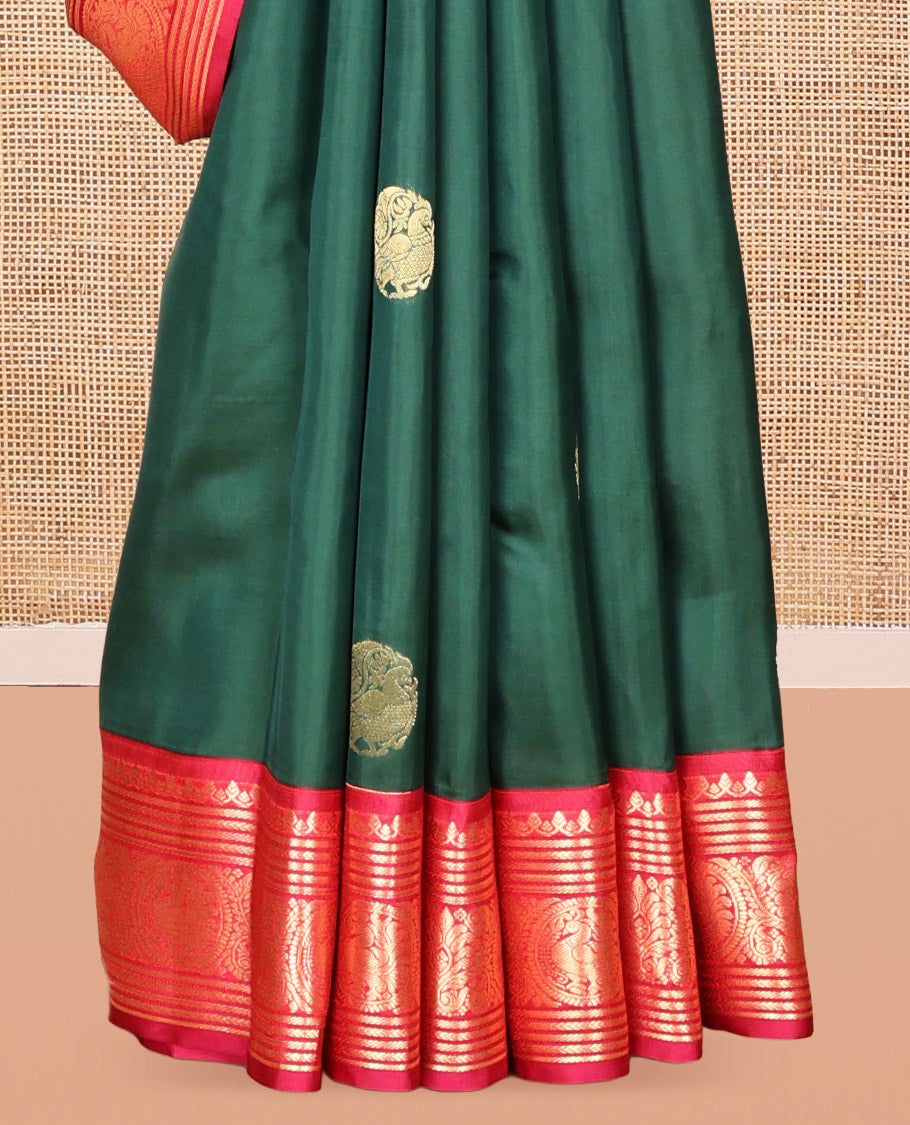 Green Vasundhara Lite Silk Mix Saree, Adorned with Mayil Buttas, a Contrast Border of Thilakam Mokku, Banaras, Kathir, and Mayil Designs, Jaal Pallu, and a Contrast Blouse