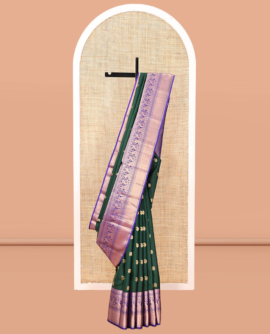 Green Vasundhara Silk Saree, Adorned with Zari Buttas, Complemented by a Contrast Border of Rudraksham, Neli, and Mayil Designs, Jaal Pallu, and a Contrast Blouse